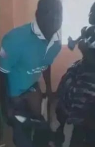 SHOCK:  A senior staff caught live bonging a junior staff in office