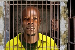 Alien Skin behind the bars over robbery (Dreads chopped off)